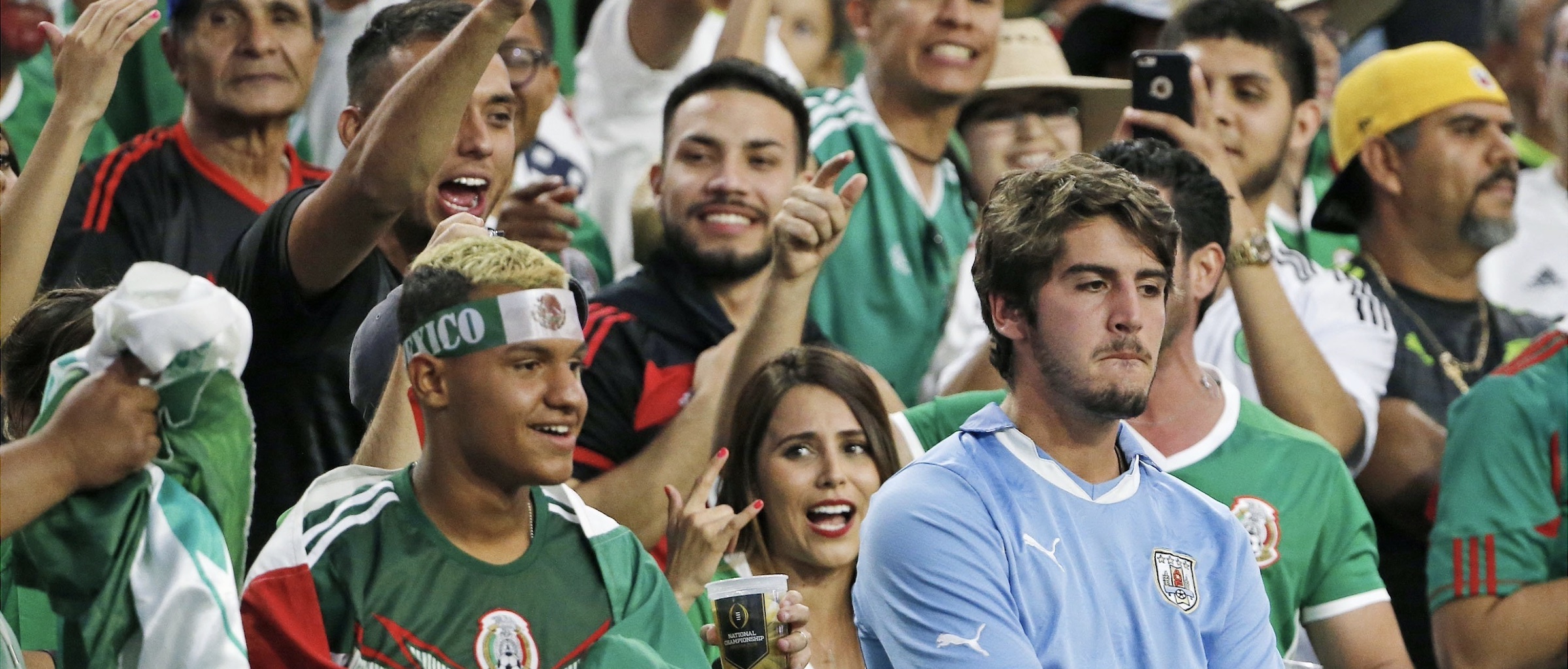 Uruguay fan surrounded by Mexican national team supporters at Copa America 2024